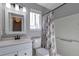 Bathroom with white vanity, neutral wall color, and shower-tub combination at 335 Tynan Dr, Erie, CO 80516