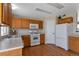 Well-lit kitchen with updated appliances and ample counter space for meal preparation at 335 Tynan Dr, Erie, CO 80516