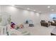 Finished basement with recreational area, seating, and play equipment at 9835 Uravan St, Commerce City, CO 80022