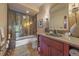 Updated bathroom with a walk-in shower, wood vanity, and a large mirror for a luxurious feel at 22683 Hagler Dr, Golden, CO 80401