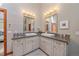 Bathroom with double vanity, framed mirrors and stylish lighting at 22683 Hagler Dr, Golden, CO 80401