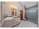 Luxurious bathroom with dual sinks, a modern shower, and stylish finishes at 22683 Hagler Dr, Golden, CO 80401