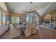 Bright dining area with vaulted ceilings and backyard views at 22683 Hagler Dr, Golden, CO 80401