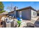 Cozy backyard patio, perfect for outdoor entertaining and relaxing at 12345 W 32Nd Ave, Wheat Ridge, CO 80033