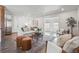 Open living space boasts modern decor, seamless kitchen views, and an inviting atmosphere at 12345 W 32Nd Ave, Wheat Ridge, CO 80033