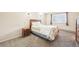 Serene bedroom with a comfortable bed, window, and warm natural light, creating a peaceful retreat at 23558 Pondview Pl # B, Golden, CO 80401