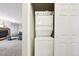 A stacked washer and dryer in a convenient space near the living area at 23558 Pondview Pl # B, Golden, CO 80401