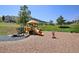 Community playground with slides and play equipment, providing a fun space for  at 23558 Pondview Pl # B, Golden, CO 80401
