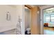 Contemporary bathroom featuring a toilet, built in vanity, and storage closet at 1401 Wewatta St # 808, Denver, CO 80202