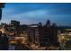 Spectacular evening cityscape view highlighting the vibrant urban setting and architectural landmarks at 1401 Wewatta St # 808, Denver, CO 80202