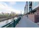 Condominium exterior view with a canal and walking path providing a scenic and tranquil environment at 1401 Wewatta St # 808, Denver, CO 80202