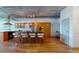 Modern kitchen with stainless steel appliances, breakfast bar, and ample cabinet space, perfect for culinary enthusiasts at 1401 Wewatta St # 808, Denver, CO 80202