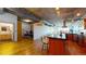 Spacious kitchen with a large island, modern appliances, and hardwood floors at 1401 Wewatta St # 808, Denver, CO 80202