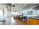 Open-concept living area showcasing the dining space, kitchen, and comfortable living room, perfect for entertaining at 1401 Wewatta St # 808, Denver, CO 80202