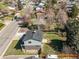 Aerial view showcasing the home's exterior, backyard, and surrounding neighborhood at 9940 Pecos St, Thornton, CO 80260