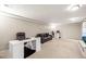 A spacious basement with a sitting area and desks, perfect for a home office at 9940 Pecos St, Thornton, CO 80260