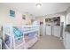 Cozy bedroom featuring a bunk bed with plenty of stuffed animals in the closet at 9940 Pecos St, Thornton, CO 80260