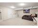 Finished basement bedroom featuring neutral walls, plush carpet, and a mushroom tapestry at 9940 Pecos St, Thornton, CO 80260