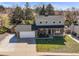 Charming two-story home featuring brick accents, a covered porch, and a spacious two-car garage at 9940 Pecos St, Thornton, CO 80260