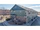 Corner townhome featuring stylish stone accents and a two car garage at 12783 Leyden St # E, Thornton, CO 80602