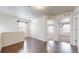 Open loft area with hardwood floors, lots of light, and flexible living space at 12783 Leyden St # E, Thornton, CO 80602