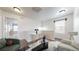 Cozy loft space features bright, natural light, hardwood floors, and stylish decor at 12783 Leyden St # E, Thornton, CO 80602