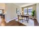 Home office with two chairs, a desk, art and natural light at 6614 Club Villa Rd, Parker, CO 80134