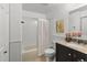 Clean bathroom featuring a shower, vanity, and fresh decor at 8555 Fairmount Dr # D204, Denver, CO 80247