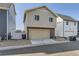 Exterior view showing a two-story home with a two-car garage at 18270 E 51St Pl, Denver, CO 80249