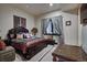 Inviting bedroom featuring a plush bed, a window, and elegant décor at 118 Gold Piece Dr, Breckenridge, CO 80424