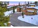 Stunning stone home featuring a circular driveway and mountain views at 118 Gold Piece Dr, Breckenridge, CO 80424