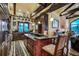 Gourmet kitchen featuring custom cabinets, granite countertops, and picturesque mountain views at 118 Gold Piece Dr, Breckenridge, CO 80424