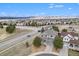 Suburban neighborhood featuring manicured lawns and two-story homes, creating a comfortable atmosphere at 2470 Robindale Way, Castle Rock, CO 80109