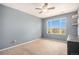 Inviting bedroom with large window offering pleasant outdoor views at 2470 Robindale Way, Castle Rock, CO 80109