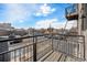 View from balcony of parking lot and neighborhood at 277 N Broadway # 202, Denver, CO 80203
