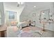 Bright bedroom with a bed, desk and chair, perfect for relaxation or studying at 10247 W Roxbury Pl, Littleton, CO 80127