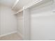 Spacious closet with ample hanging space and carpeted floor at 3000 S Elati St, Englewood, CO 80110
