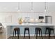 Kitchen featuring marble countertop, stainless steel appliances, and modern lighting at 3000 S Elati St, Englewood, CO 80110