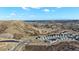 Elevated view showcasing a new development near rolling hills, displaying the community's location and landscape features at 1044 Oleander St, Castle Rock, CO 80109