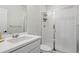 Modern bathroom featuring a white vanity, toilet, and a glass-enclosed shower at 1044 Oleander St, Castle Rock, CO 80109