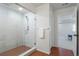 Modern bathroom featuring a glass-enclosed shower with a sleek design and contemporary fixtures at 1044 Oleander St, Castle Rock, CO 80109