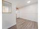 Bright dining area featuring hardwood floors and minimalist wall decor at 1390 N Emerson St # 105, Denver, CO 80218