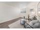 Bright living room with modern furniture and neutral decor at 1390 N Emerson St # 105, Denver, CO 80218