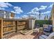 Backyard with a brick patio, garden bed, shed, and seating area perfect for outdoor relaxation at 3061 W 18Th Ave, Denver, CO 80204