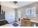 Bright kitchen features stainless steel appliances, wood countertops and cabinets, and stylish tile backsplash at 3061 W 18Th Ave, Denver, CO 80204