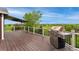 Beautiful back deck with grill offering panoramic views of the surrounding landscape on a sunny day at 12888 Buckhorn Creek St, Parker, CO 80134