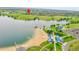 Scenic aerial view of home's proximity to lake and community beach at 26631 E Arbor Dr, Aurora, CO 80016