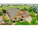 Aerial view of the property showcasing lush landscaping and neighborhood setting at 26631 E Arbor Dr, Aurora, CO 80016
