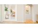 Partial view into bedroom with seating and natural light at 26631 E Arbor Dr, Aurora, CO 80016