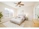 Cozy bedroom with a comfortable bed, large window for natural light, and stylish decor at 26631 E Arbor Dr, Aurora, CO 80016